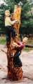 Children Playing On A Tree